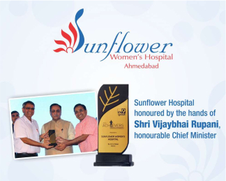 Honoured By Shri Vijaybhai Rupani